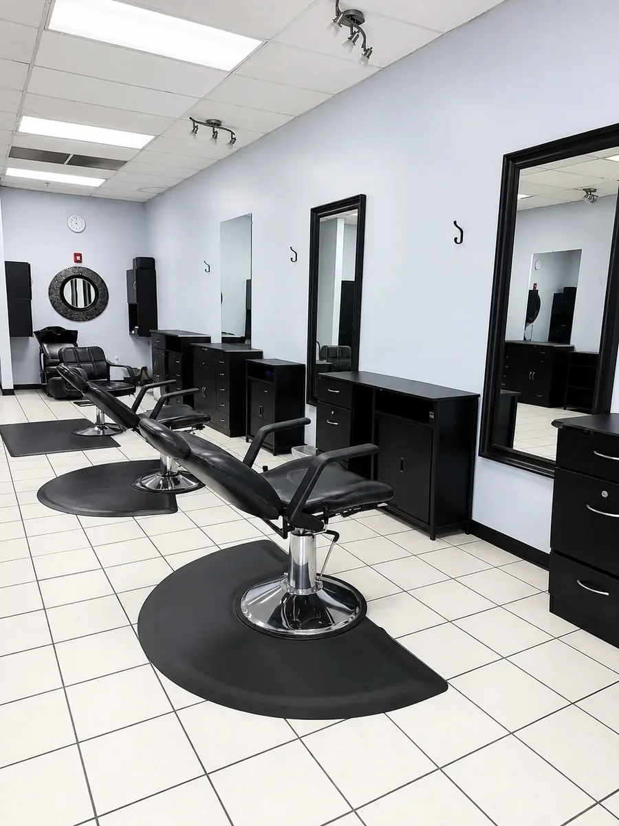 Inside Allure Salon & Spa — styling stations and mirrors